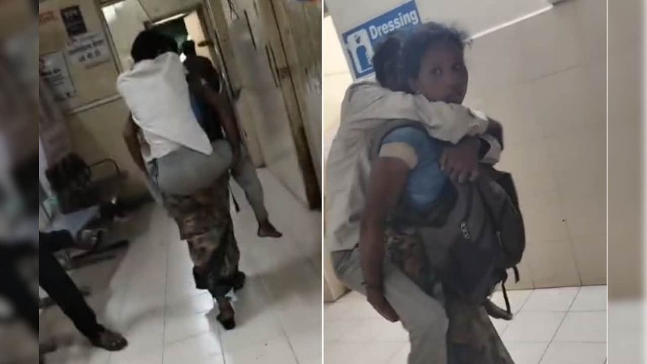 VIDEO: पेट पर बैग, पीठ पर पति! अस्पताल में इलाज के लिए भटकती रहीं बेबस पत्नी, डीन बोले- ये AI है