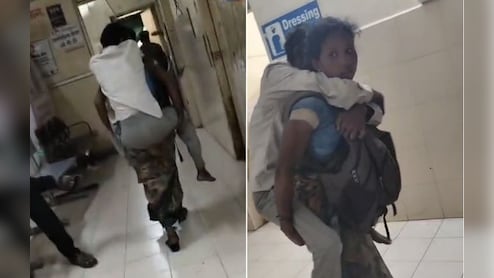 VIDEO: पेट पर बैग, पीठ पर पति! अस्पताल में इलाज के लिए भटकती रहीं बेबस पत्नी, डीन बोले- ये AI है