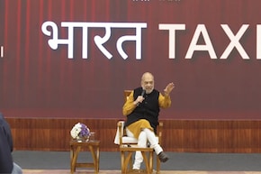 'भारत टैक्&zwj;सी का किराया ज्&zwj;यादा नहीं', अमित शाह बोले- निजी कंपनियां खुद घाटा सहकर कर रहीं खेल!