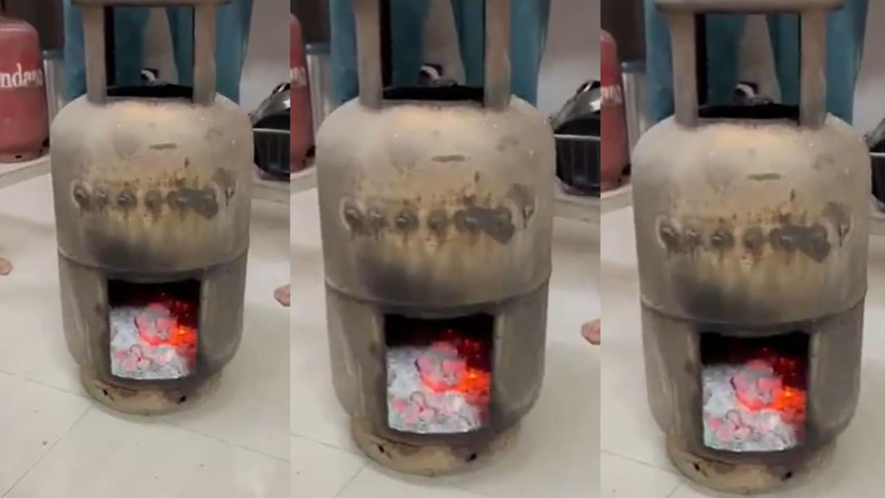 LPG के बढ़े दाम, महिला ने खाली गैस सिलेंडर का चूल्हा बना सें