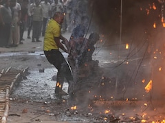 Body In Wheelchair, Couple's Last Hug: The Human Face Of Delhi Hotel Tragedy