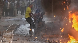 Body In Wheelchair, Couple's Last Hug: The Human Face Of Delhi Hotel Tragedy