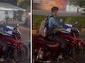 'वर्क फ्रॉम बाइक', चलती बाइक पर लैपटॉप से काम करता दिखा युवक, वीडियो हुआ वायरल