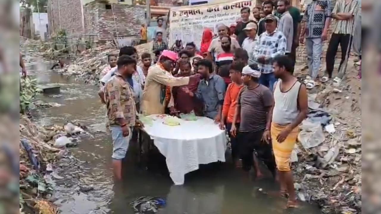 Video: BJP Councillor In Agra Cuts Birthday Cake Standing In A Drain