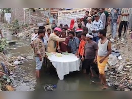 Video: BJP Councillor In Agra Cuts Birthday Cake Standing In A Drain