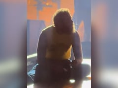 Post Malone Slumps To Ground, Lights A Cigarette And Stares Blankly Into Crowd At Recent Concert