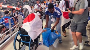 Wheelchair-Bound Japan Fan Collects Trash After FIFA World Cup Match, Wins Internet
