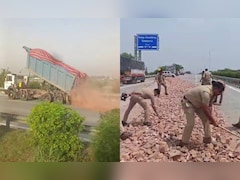 ओवरलोड था ट्रक, RTO की चेकिंग देखते ही हाईवे पर ही माल खाली कर भागा ड्राइवर; वीडियो हुआ वायरल