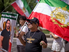 Flouting FIFA Rules, Fans Bring Back Pre-Revolutionary Iran Flags