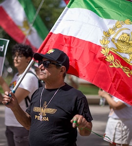 Flouting FIFA Rules, Fans Bring Back Pre-Revolutionary Iran Flags