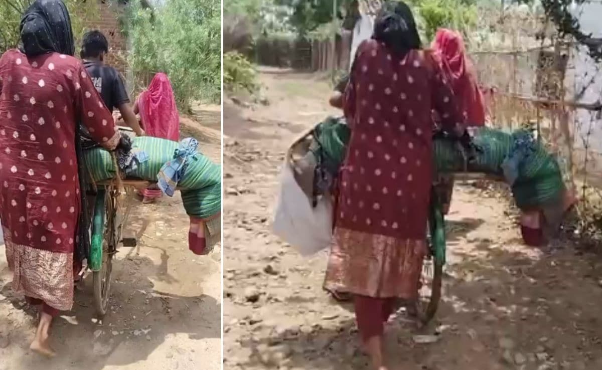 bargarh odisha man carries father dead body on bicycle