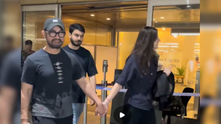 Aamir Khan And Gauri Spratt Spotted Walking Hand-In-Hand At Airport Ahead Of July Wedding