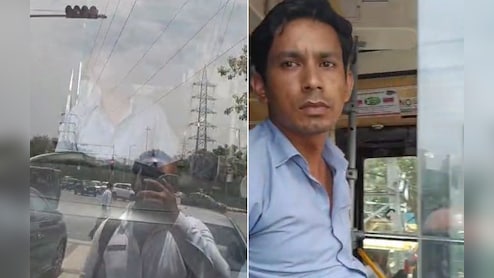 गुरुग्राम: बीच रोड पर बस के सामने खड़ा हुआ शख्स, कहा- गेट नहीं खोल रहा कंडक्टर, वीडियो वायरल