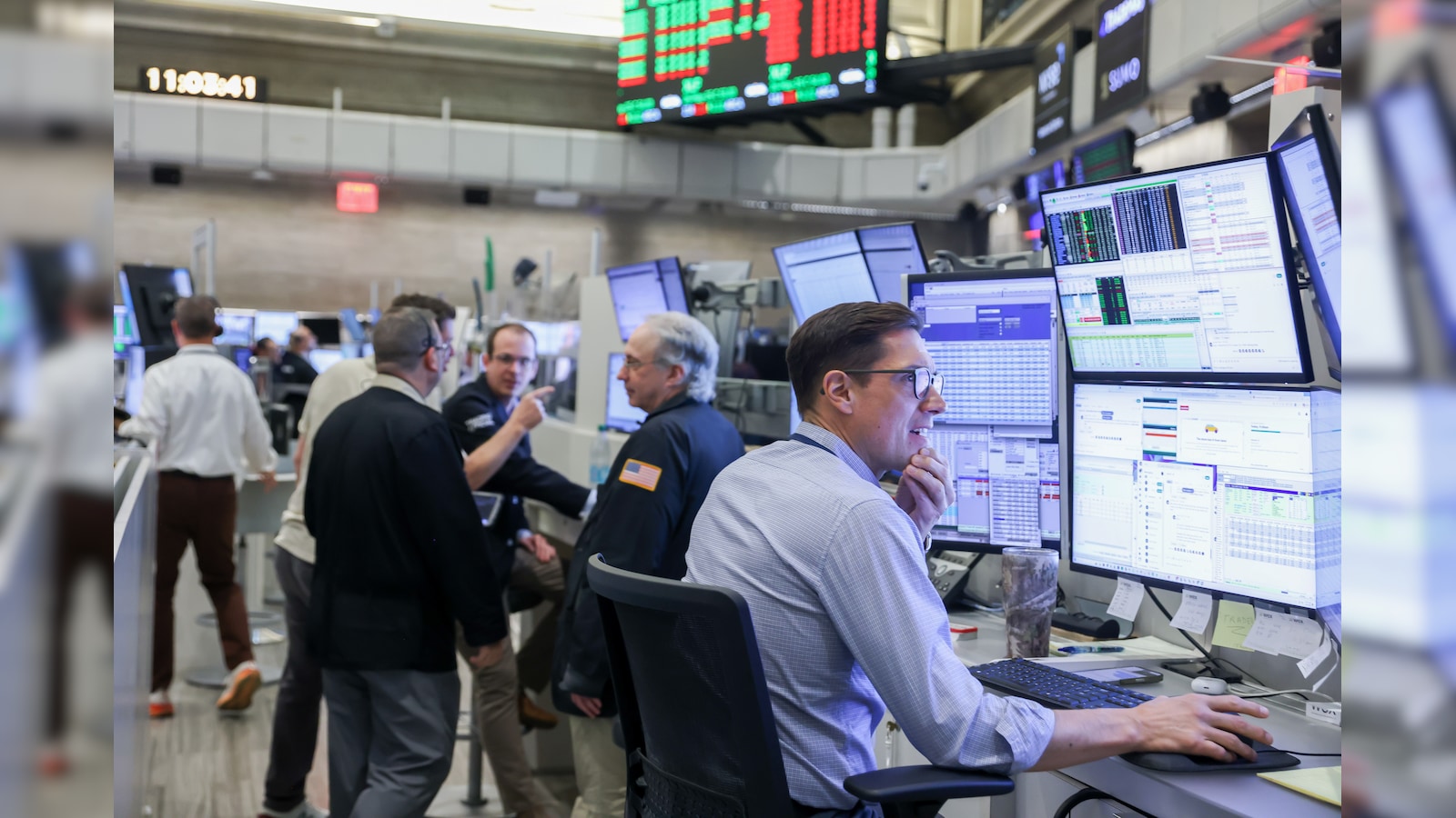 Wall Street rises as traders digest softer inflation data.