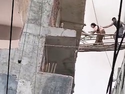 Watch: Residents Escape Noida Building Blaze Using Makeshift Bamboo Bridge