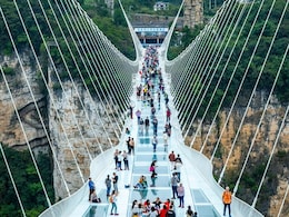 Teen Reportedly Cracks Glass Panel At China's Famous Glass Bridge With Umbrella