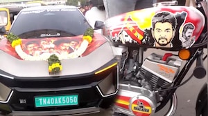 Vijay Fans Arrive In Poster-Wrapped Cars, Bikes To Watch <i>Jana Nayagan</i> In Chennai