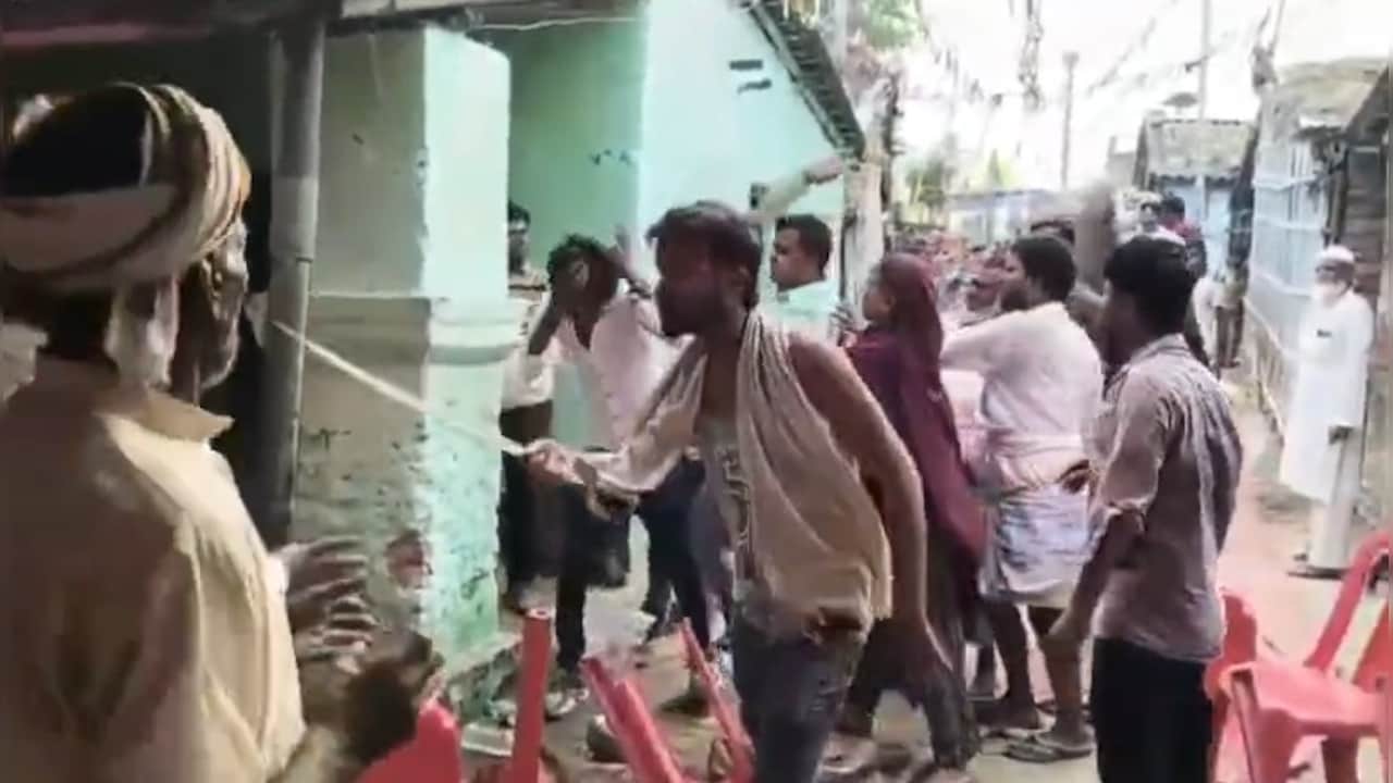 A man was seen pointing a sword at a guest
