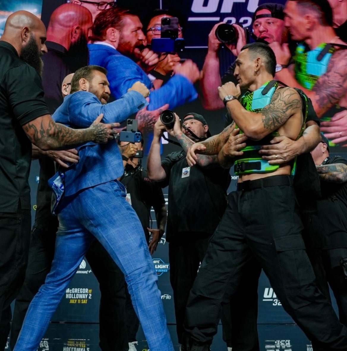 Conor McGregor Rips Max Holloway's Glasses Off In Fiery UFC 329 Face-Off