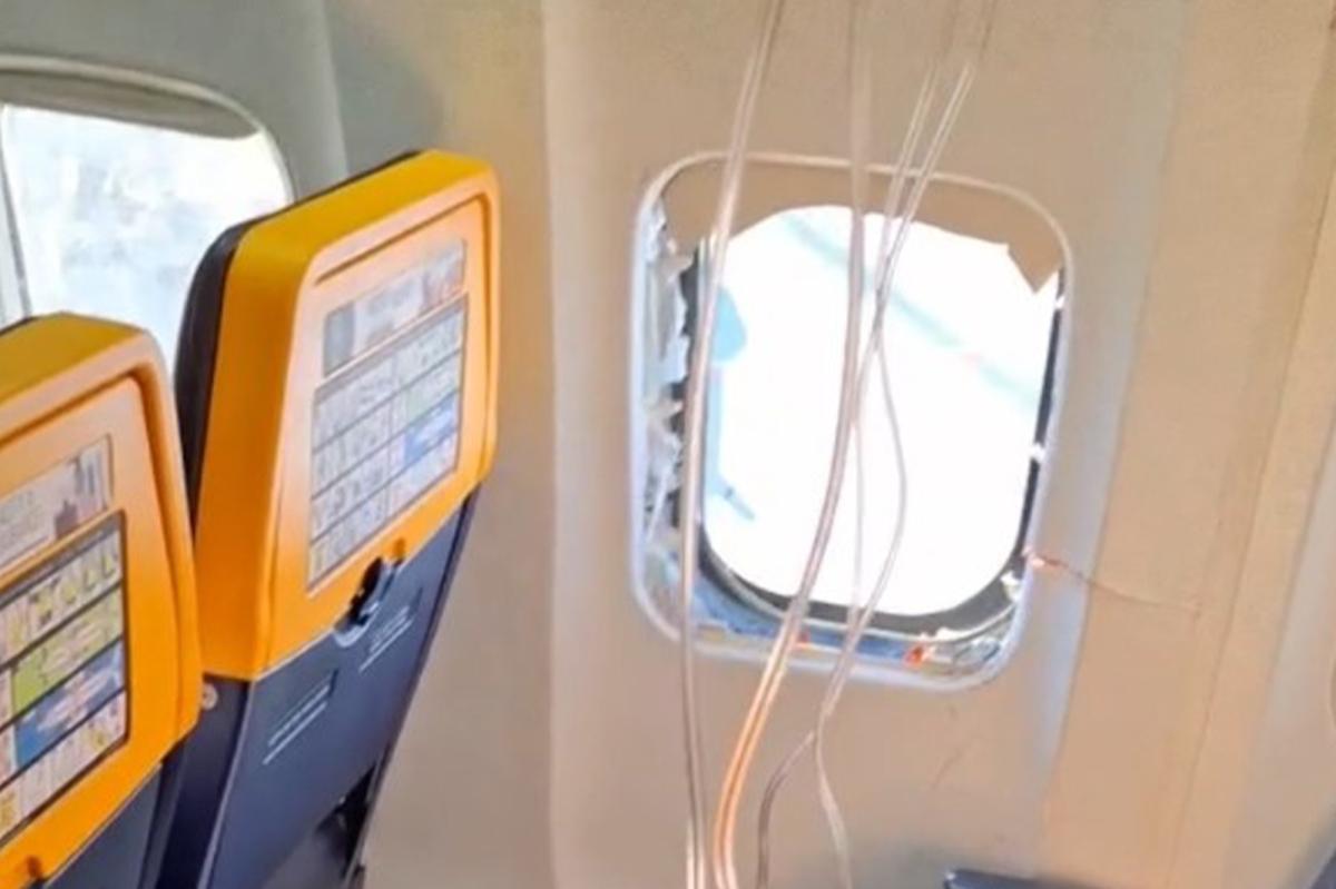 Head And Shoulders Outside: Man Nearly Sucked Out Of Flight As Window Detaches