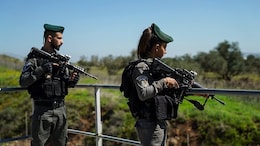 Israeli Officer Filmed Tossing Stun Grenade Into Palestinian Vehicle, Preventing Driver's Exit | Watch