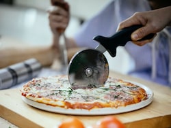 The Secret Behind Perfect Pizza Slices Starts With The Right Cutter