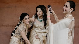 Tamannaah Bhatia Turns Photographer For Trisha Krishnan At Kushboo Sundar's Daughter's Wedding