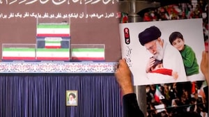 Child's Coffin Beside Ali Khamenei's Casket Becomes Symbol Of Grief And Loss