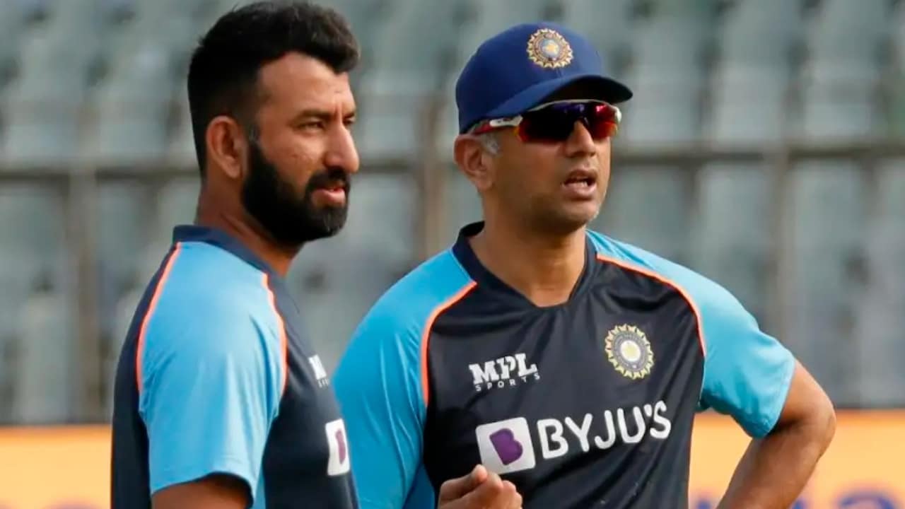 Chteshwar Pujara with Rahul Dravid
