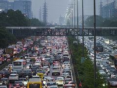 Long Jams And A Road Cave-In: Heavy Rain Takes Weighty Toll On Gurugram