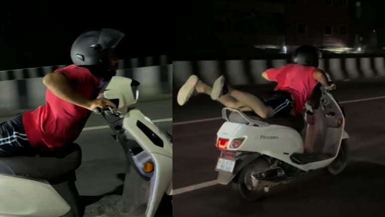 स्कूटी पर स्टंटबाजी, लड़के की इस हरकत को देख लोगों का फूटा गुस्सा, VIDEO पर ही लगा दी क्लास