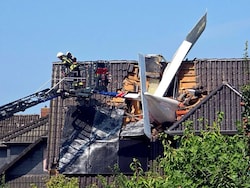 Two Dead After Plane Crashes Onto German House's Roof