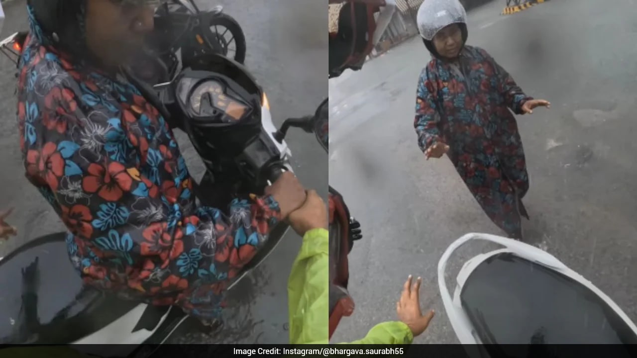 Watch: Chhattisgarh Man Rescues Woman Biker Stuck On Waterlogged Road, Wins Hearts Online