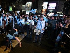Some Scream, Others Cry, Many Sprint Shirtless: How Argentina Fans Celebrate World Cup Semi-Final Victory
