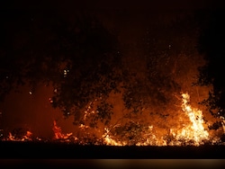 Over 30,000 Evacuated As Wildfires Burn Through France And Spain