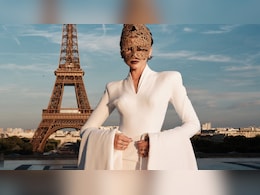 Zendaya Channels Goddess Glamour In Alexander McQueen And Gold Headpiece At <i>The Odyssey</i> Paris Premiere