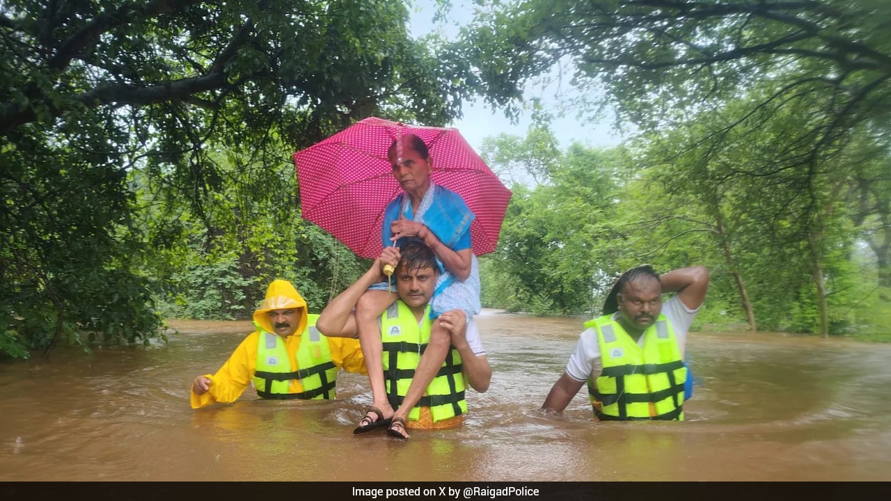 Maharashtra Cop Carries 72-Year-Old Woman On Shoulders During Flood Rescue