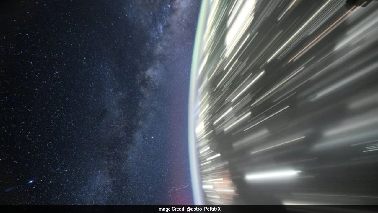 Astronaut Shares Breathtaking Image of Milky Way Shining Above Earth's City Lights