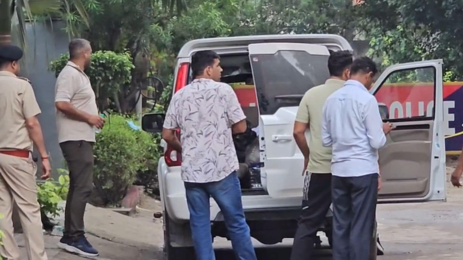 Crime Branch team takes away evidence in their vehicle Crime Branch team takes away evidence in their vehicle