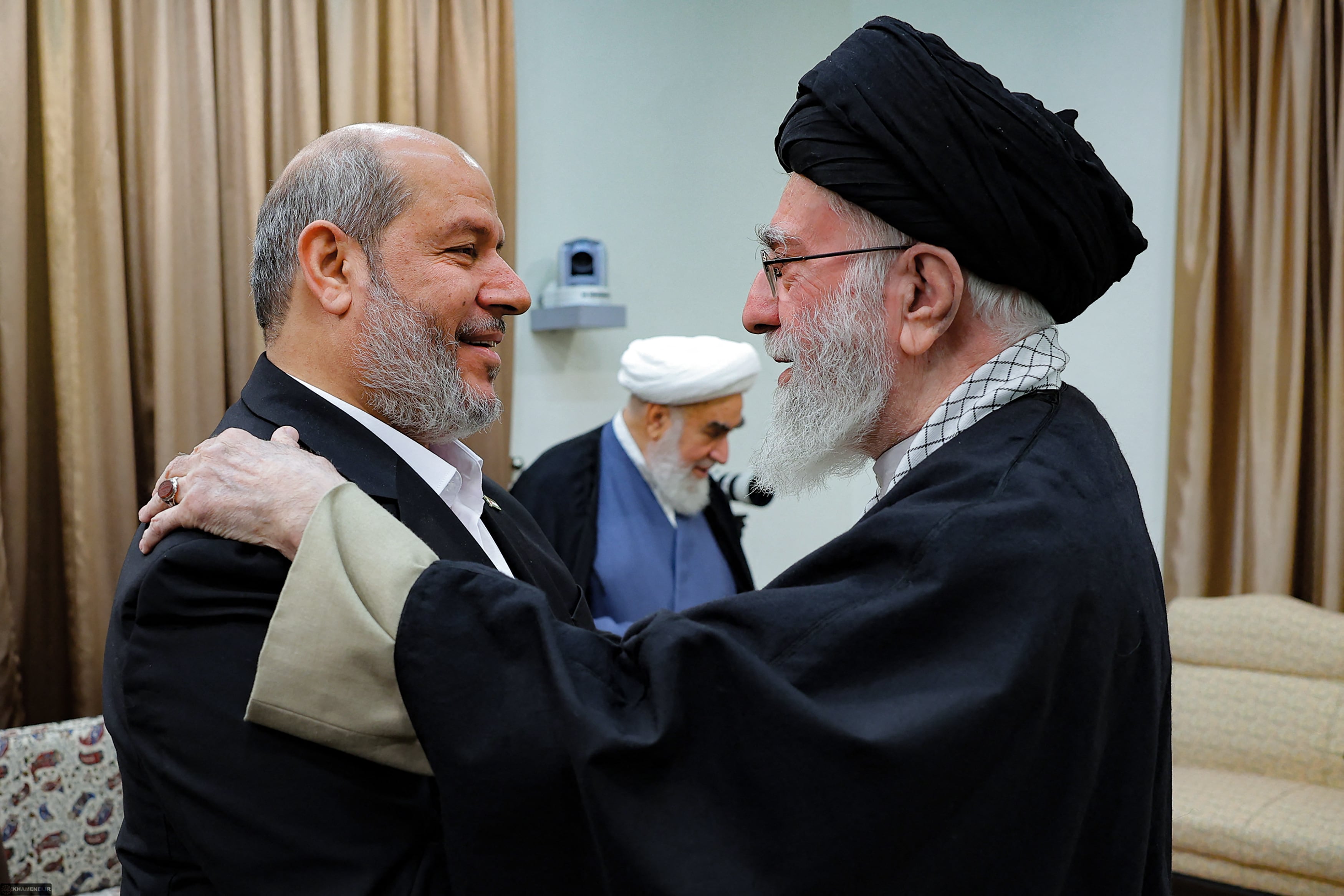 Ali Khamenei welcoming Khalil al-Hayya in Tehran. Ali Khamenei welcoming Khalil al-Hayya in Tehran.