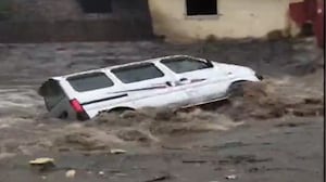 Maharashtra Rain Fury: Car Swept Away in Vasai, Driver Rescued by Locals