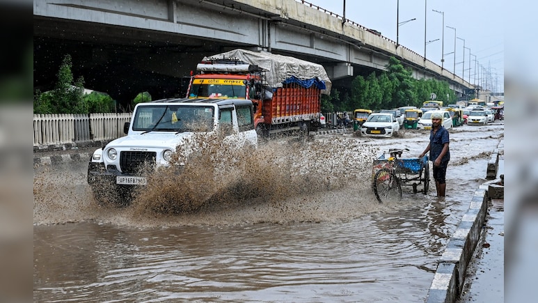 Delhi-NCR Rains: Roads Flooded, Traffic Crawls As Heavy Showers Lash Capital; IMD Issues Red Alert