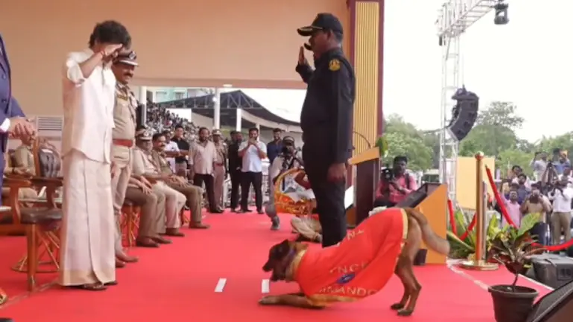 Sniffer Dog Rocky Welcomes Vijay With Flowers At Chennai Event