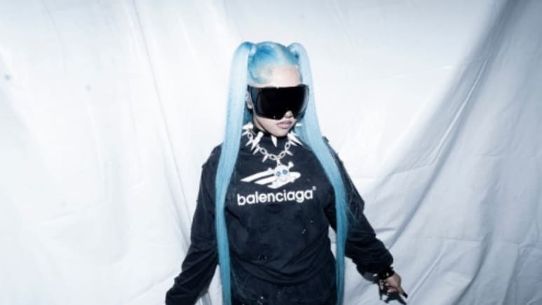 North West Debuts Gothic Makeover With Blue Hair, Face Piercings, And Skull Lip Art