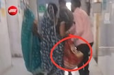 VIDEO: सरकारी अस्पताल की शर्मनाक तस्वीर, स्ट्रेचर नहीं मिला तो महिला को चादर में लपेटकर बेड तक पहुंचाया