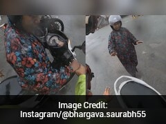 Watch: Chhattisgarh Man Rescues Woman Biker Stuck In Rain, Wins Hearts Online