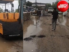 ग्रेटर नोएडा: बारिश में चल रहा था सड़क निर्माण का काम , वायरल VIDEO के बाद हुआ एक्शन