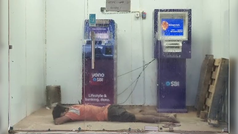 Watch: SBI ATM Becomes 'Bedroom' In UP's Mau As Man Sleeps In AC Comfort