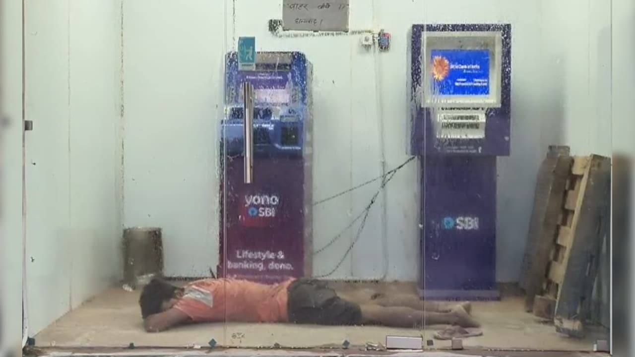 Watch: SBI ATM Becomes 'Bedroom' In UP's Mau As Man Sleeps In AC Comfort