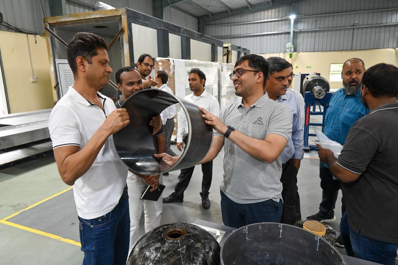 Mukesh Bansal visiting the Skyroot Aerospace shop floor with Pawan Chandana showing him rocket components